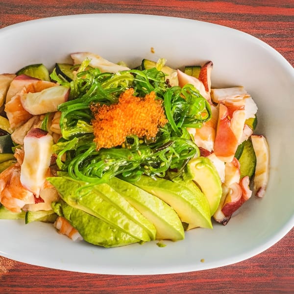 Akita Sushi Gourmet's seafood salad with avocado, seaweed, cucumber, and orange tobiko.